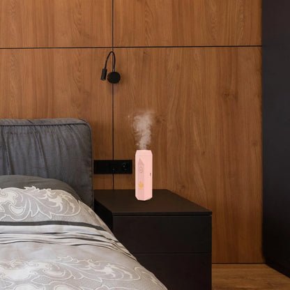 USB rechargeable electronic incense burner emitting vapor near a bed in a modern bedroom.